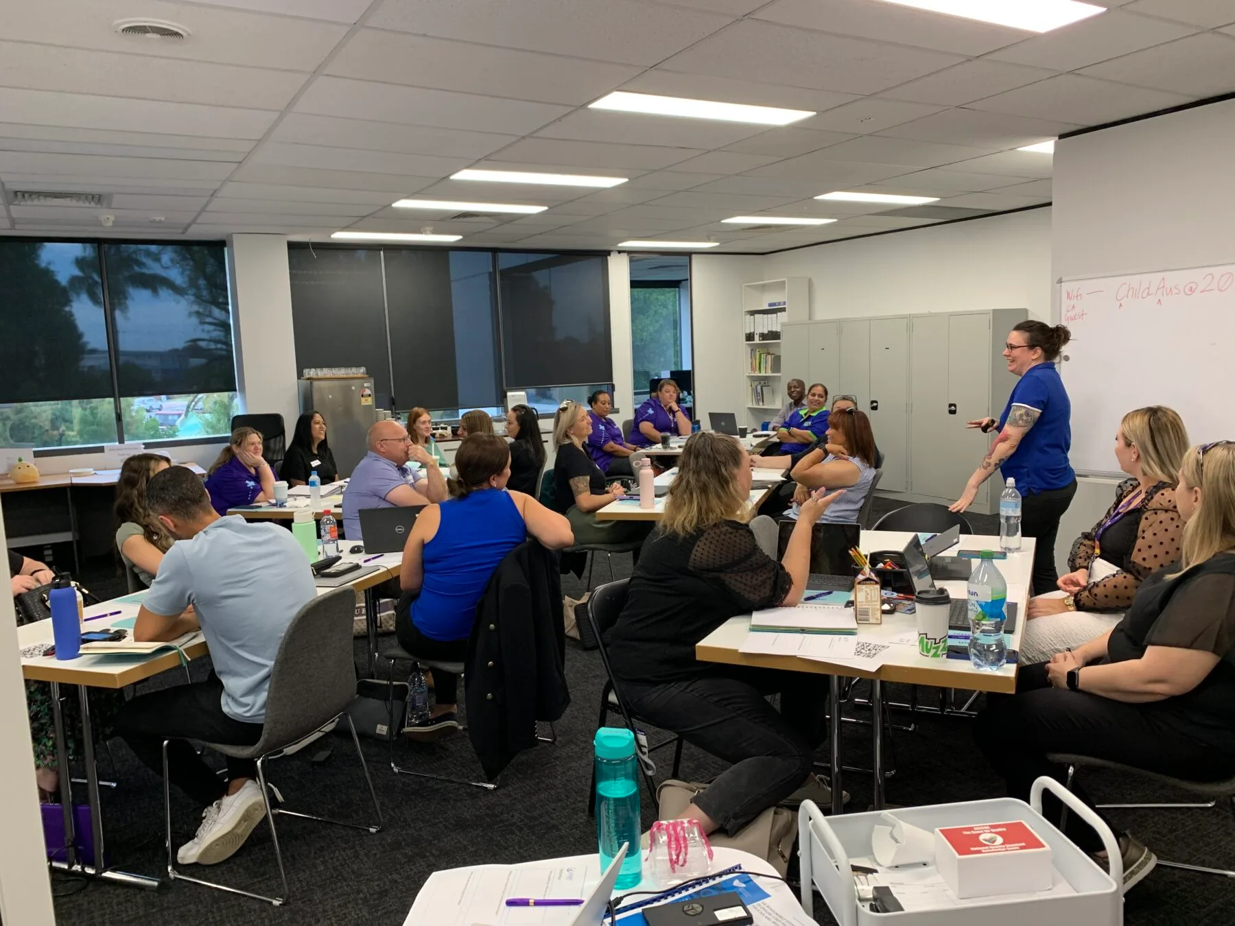 Educational Leaders WA and NT (1) An image of educators sitting at desks talking and planning